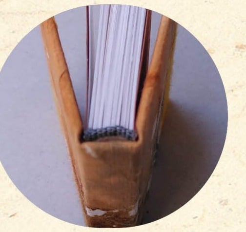 Reliure Traditionnelle - détail de la tranchefile comète